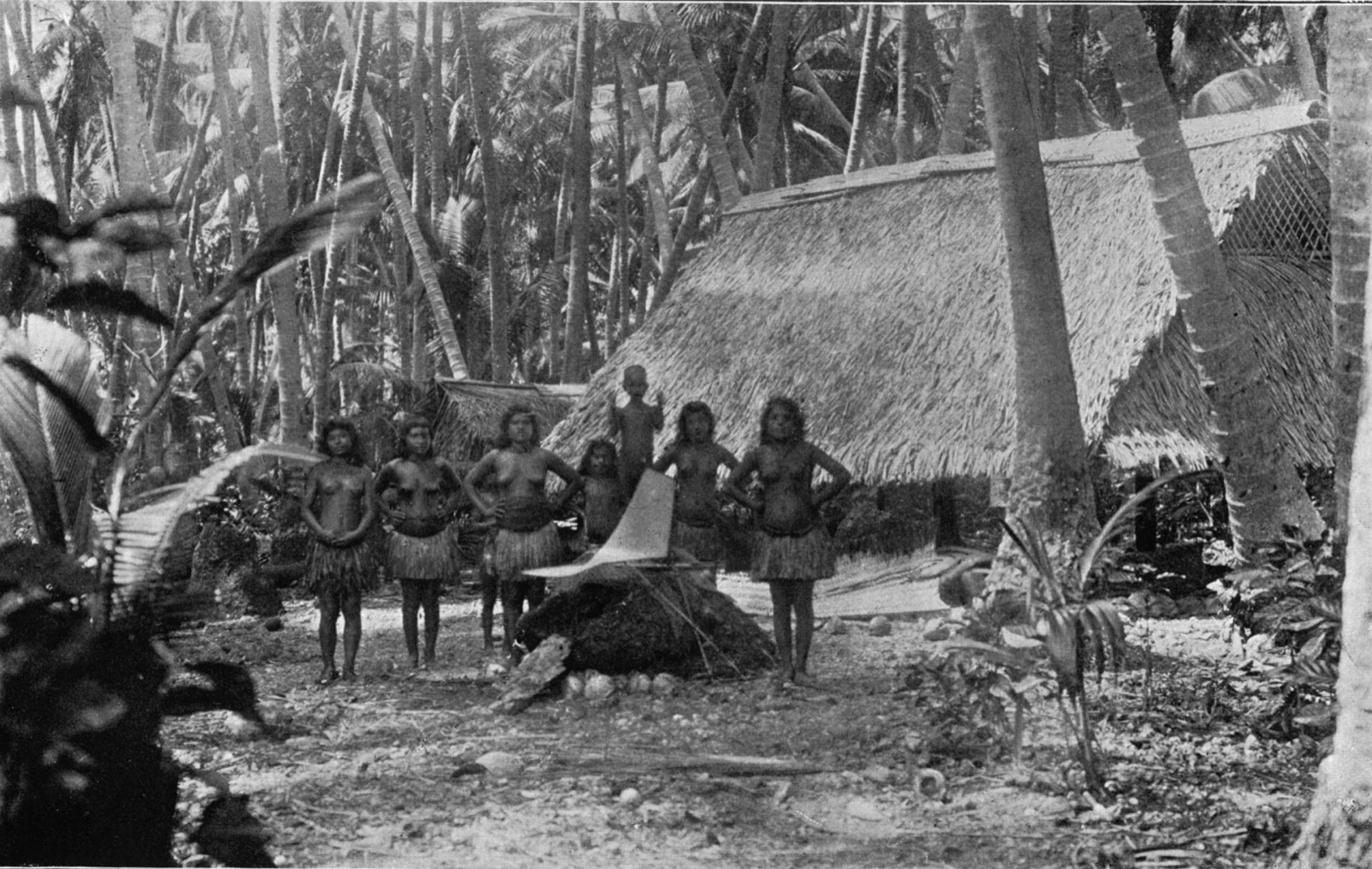 Nauruans gathered beneath trees at Arenibek, photographed in 1896